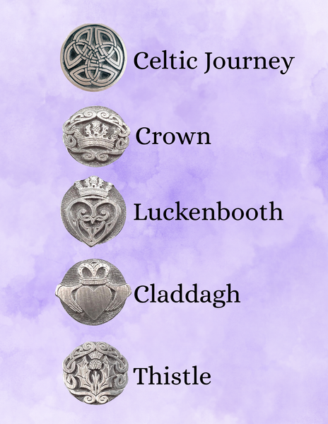 Collection of silver jewelry charms with labels on a purple background